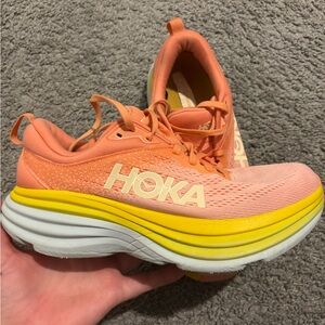 Hoka Coral and Yellow Athletic Shoes